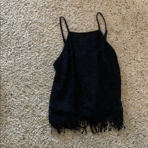 Black top with fringe on bottom